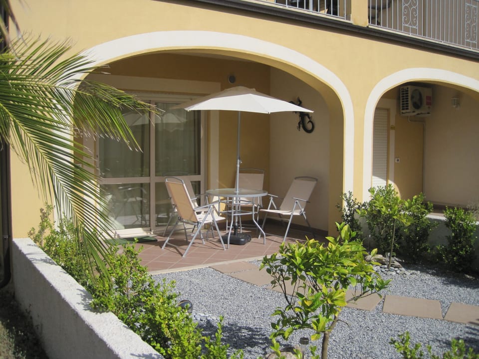 Front of Apartment showing Terrace & Garden