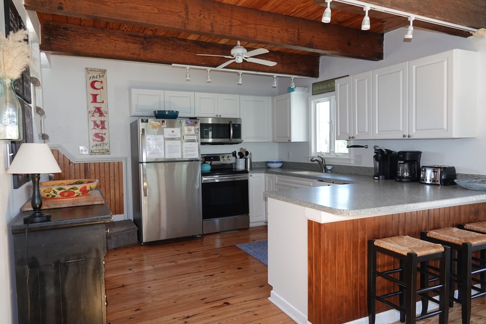 The kitchen is a good size and well stocked with utensils, pots pans etc.