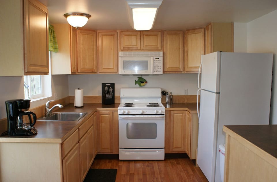Kitchen - Kitchen is fully equipped with everything you need to cook a meal, as well as a view of the bay.