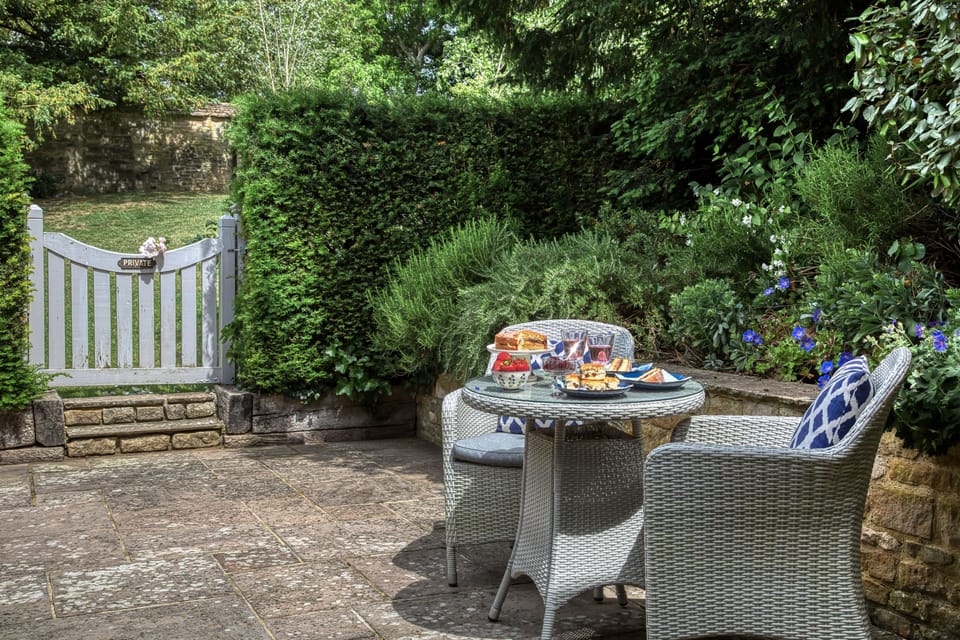 Dine al fresco in the courtyard garden