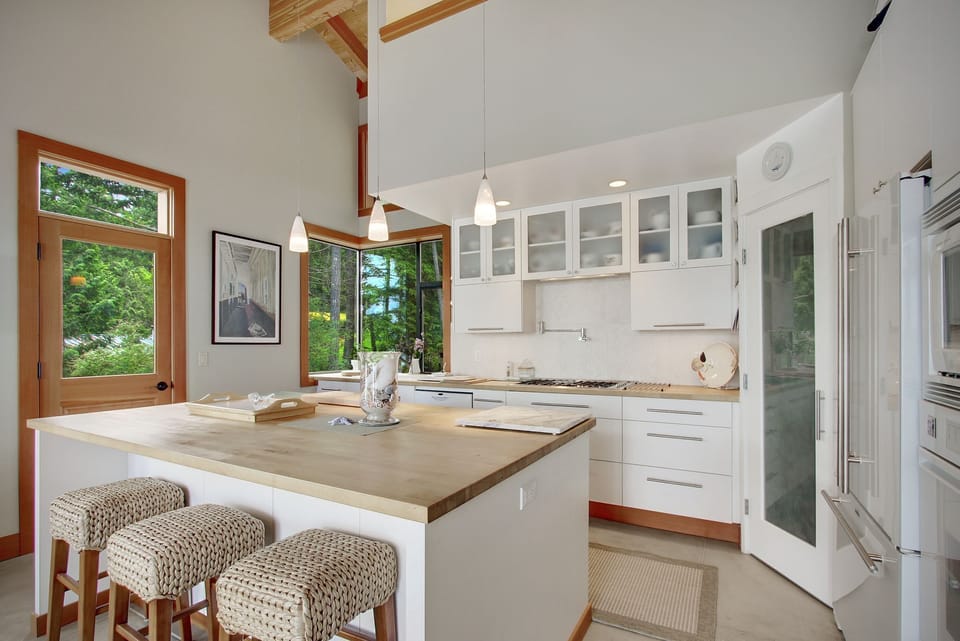 The kitchen is fully equipped and spacious. The butcher block counters, propane cook-top, and water-views will make preparing meals an enjoyable activity.