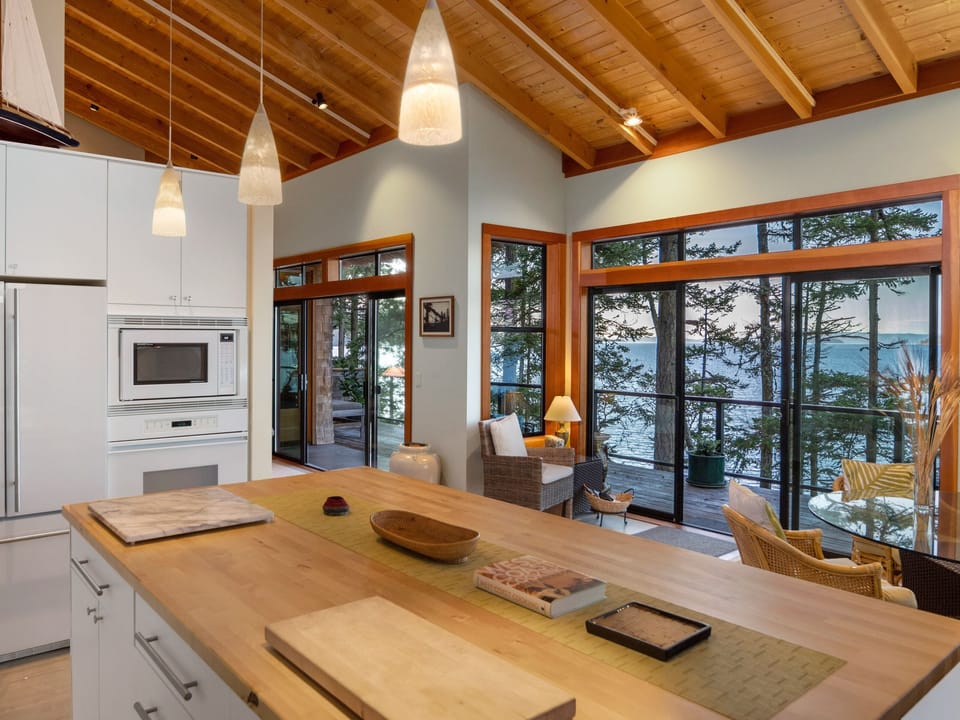 The kitchen is fully equipped and spacious. The butcher block counters, propane cook-top, and water-views will make preparing meals an enjoyable activity.