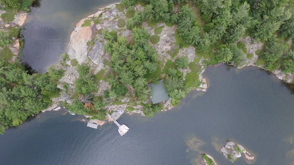 Drone view of Pijiki Bay with Main Cabin and Dock