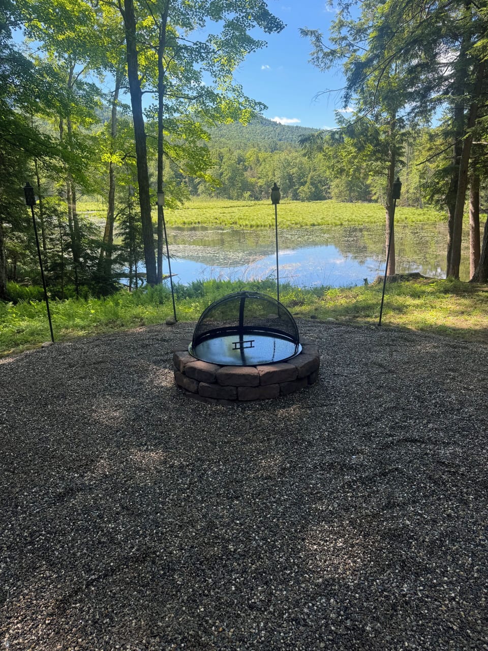 Back yard fire pit area, overlooking the pond.