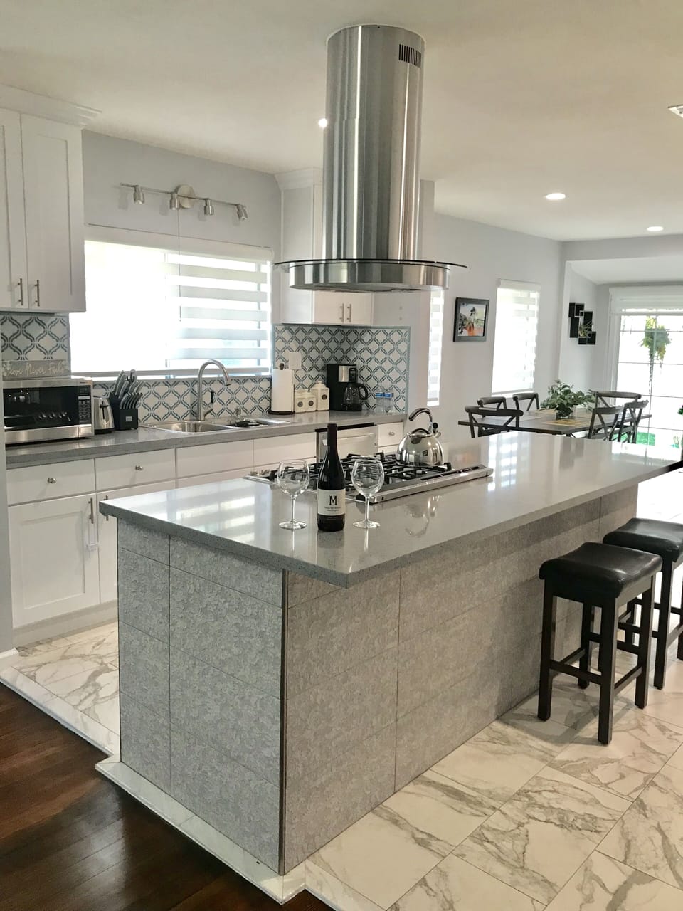 Master suite with king size bed, full bath, and smart TV