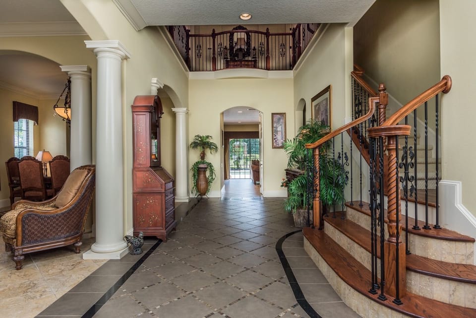 Grand entrance hallway with high ceiling 