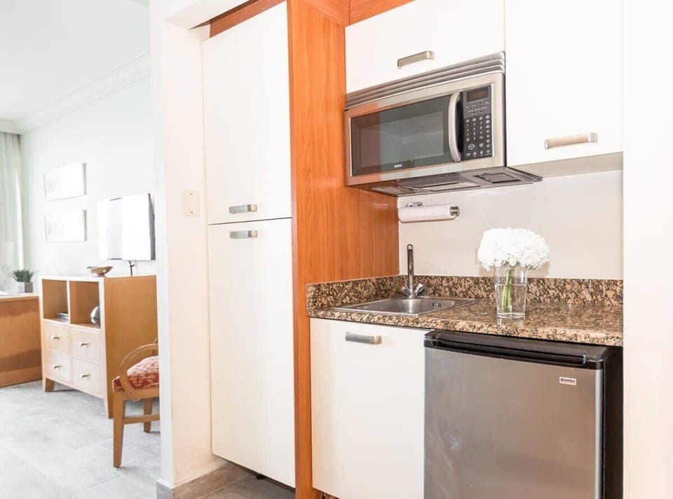 Kitchenette equipped with microwave &amp; small fridge