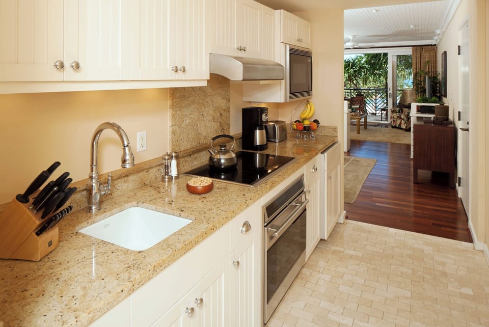 Ocean view gourmet kitchen in Master Suite! - Wolf appliances, Subzero under counter fridge with freezer and ice maker.