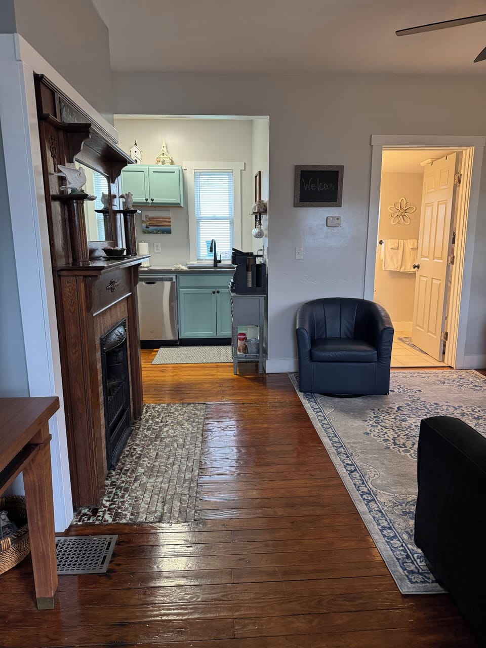 Entry View to Livingroom, Kitchen and Upstairs Full Bath