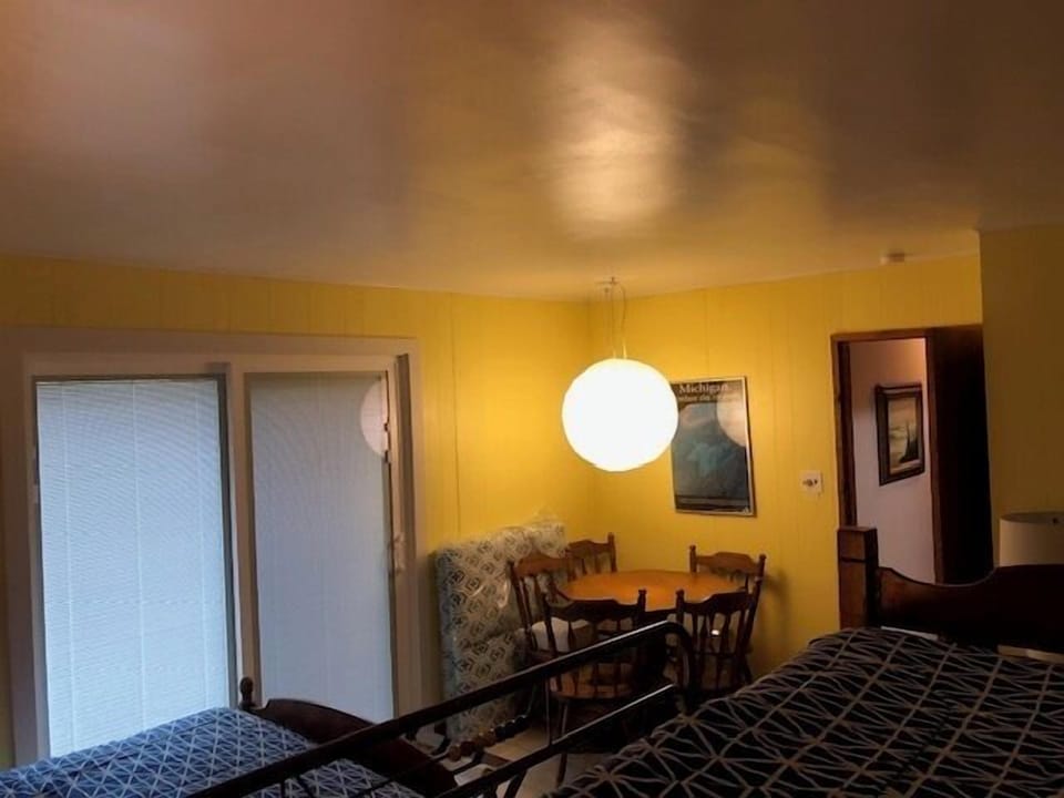 Second Bedroom - Full Bed and Bunk Set with door to the deck