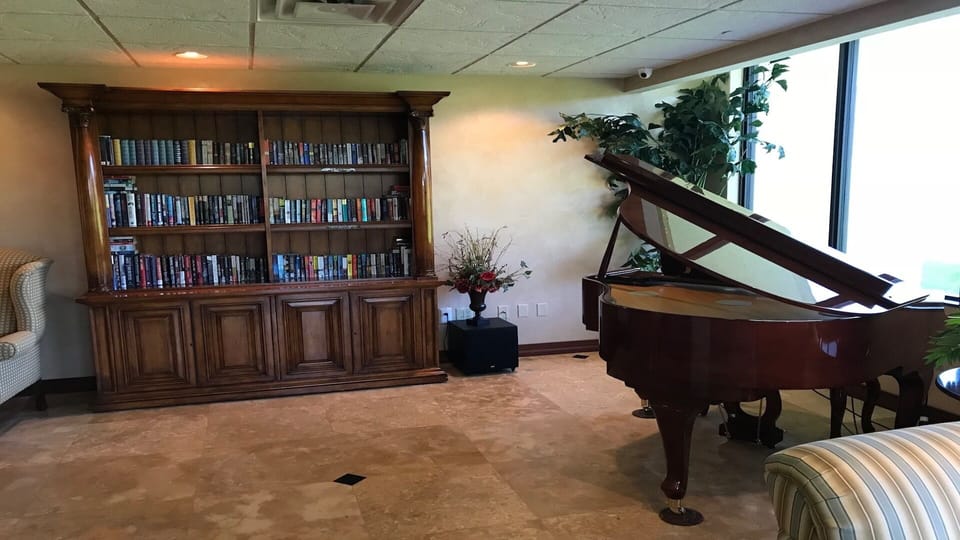 Piano and library area in Social-room.