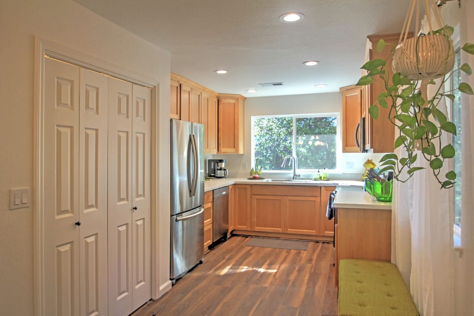 Large pantry stocked with extra serving dishes, bake ware, etc.