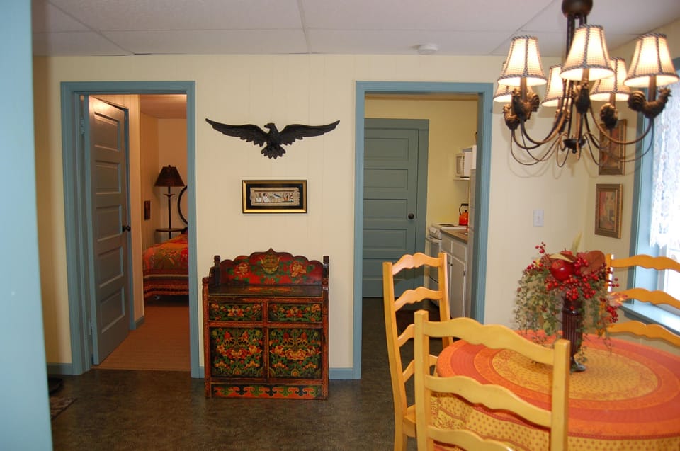 View into the BR and kitchen from the dining area