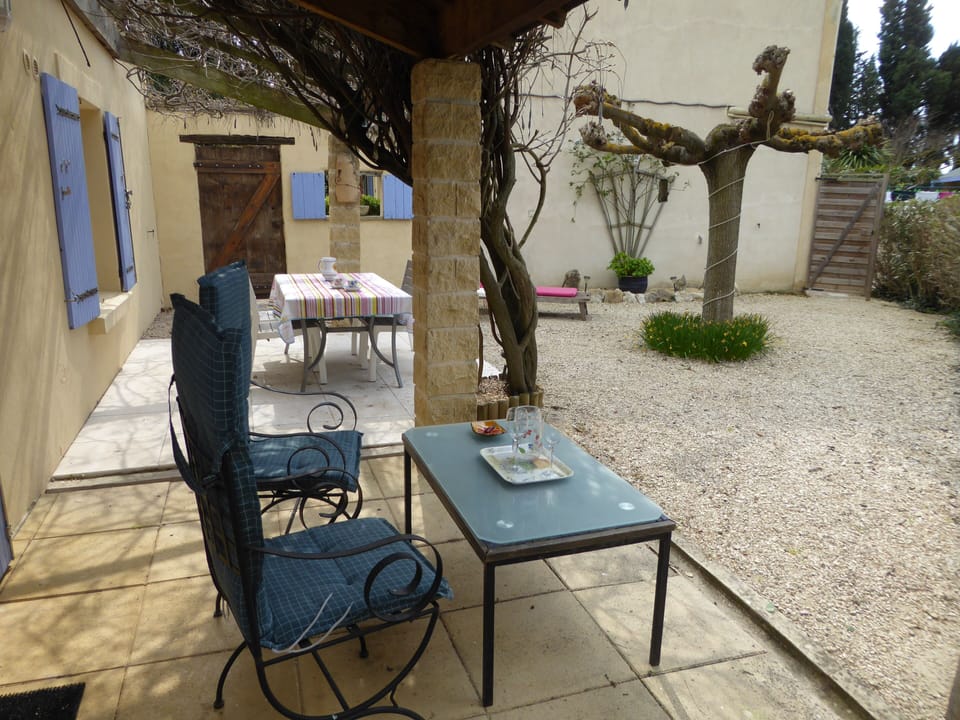 Outside seating and dining area with lounger
