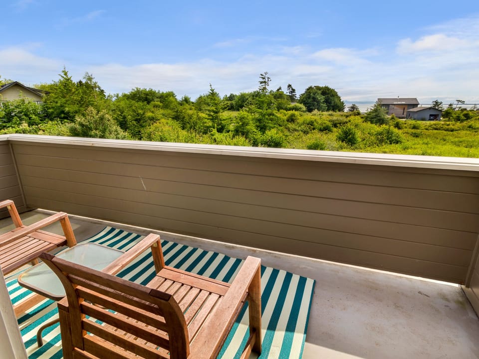 Balcony with views of the Strait of Juan de Fuca, Olympic Mountains, and Victoria B.C.
