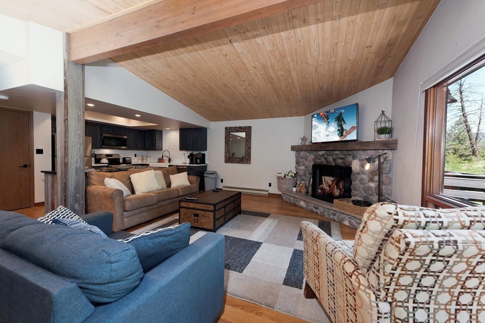 Main Living Space and Kitchen - Wood burning fireplace (firewood provided), TV, Views and Deck access