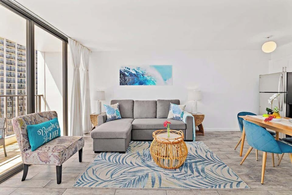 The living room has a L-shaped sofa, one person can sleep on it