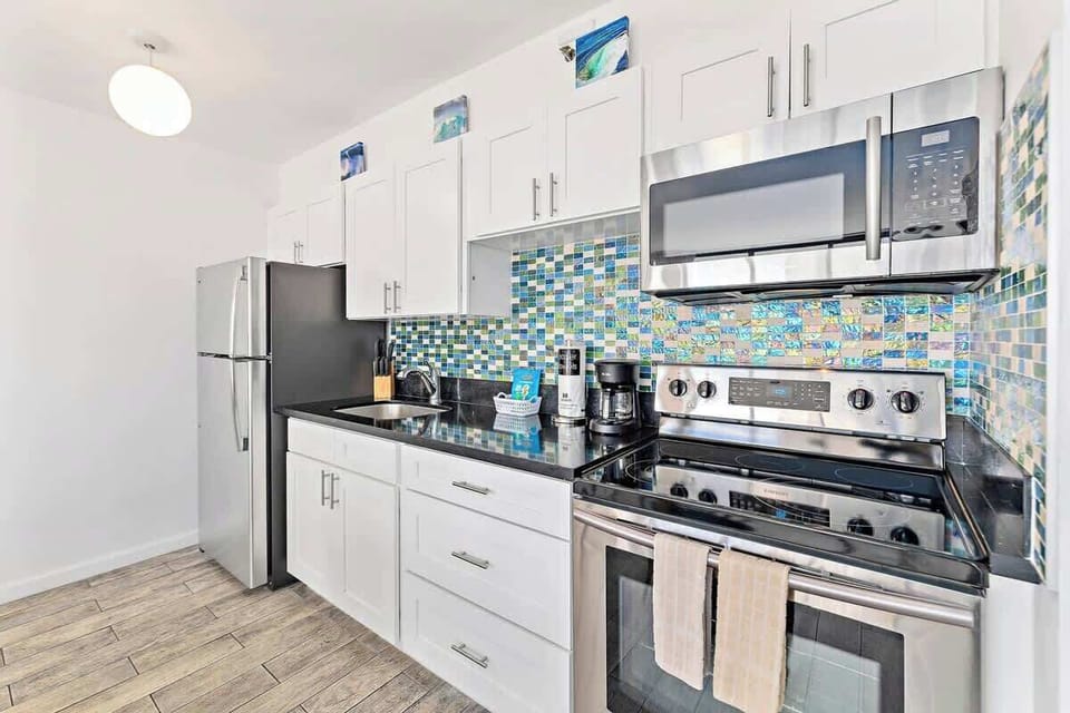 The fully equipped kitchen is perfect for your culinary needs!