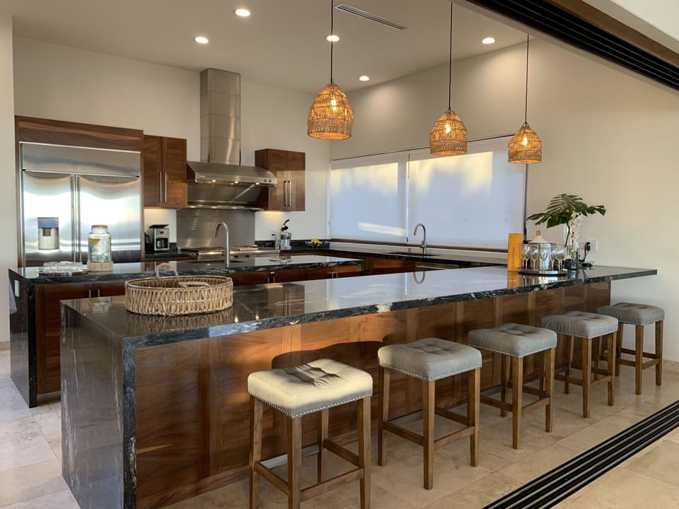 Large fully equipped kitchen. Can be closed off with wooden sliding doors.
