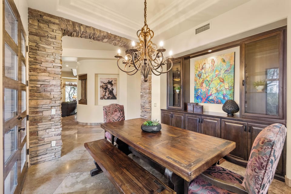 Dining Room - Dining room with French doors to the entry patio with fireplace