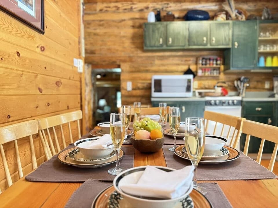 Dining room table located in the kitchen perfect for 6 people.