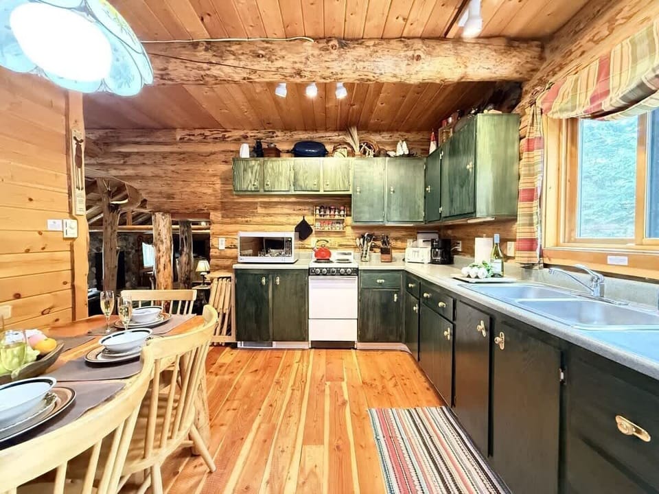 The kitchen is located adjacent to the living room.