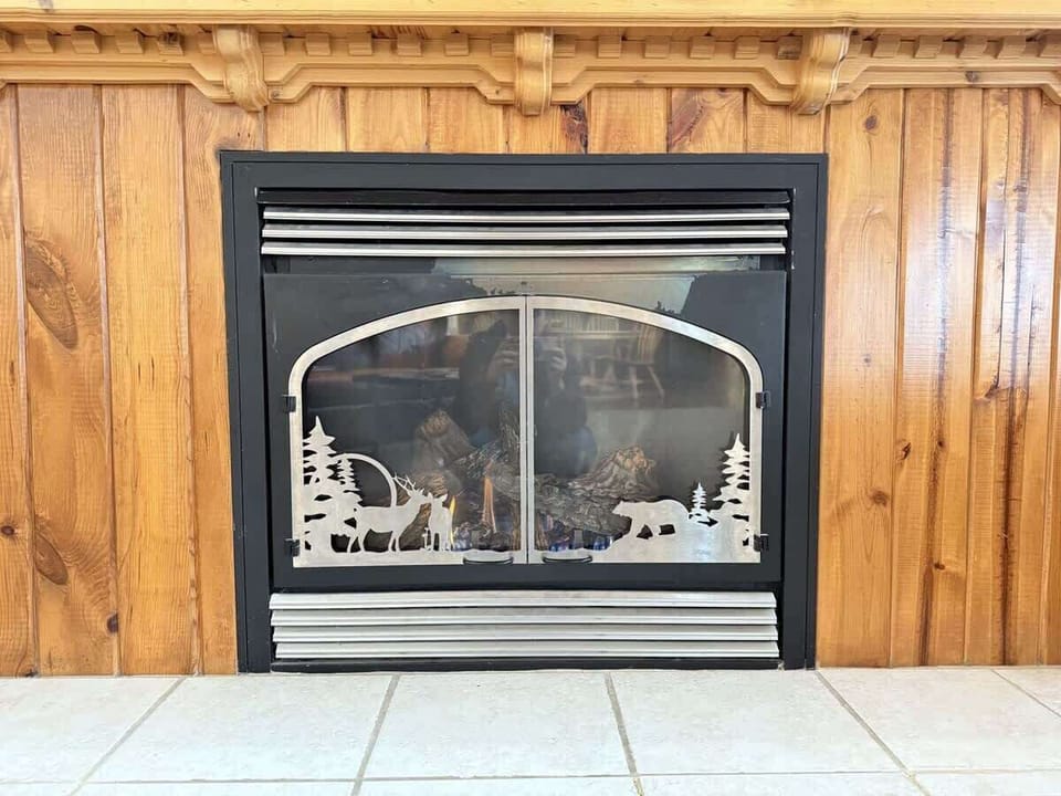 Main level living area with a fireplace for those cold days.