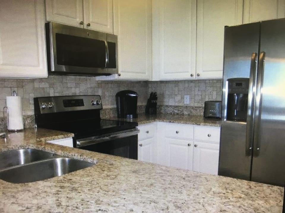 Kitchen has new sink, granite & both a Keurig and traditional coffee maker