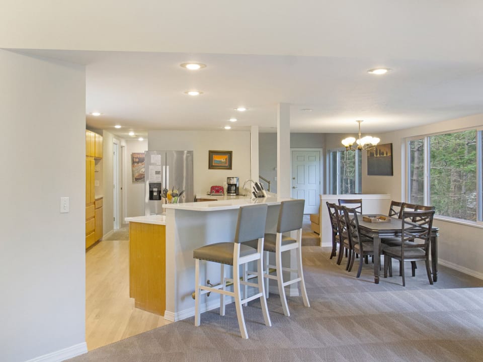 Sunken dining room located off of the kitchen and living room.