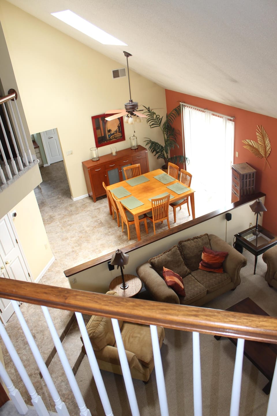 Open floor plan seen from second floor balcony