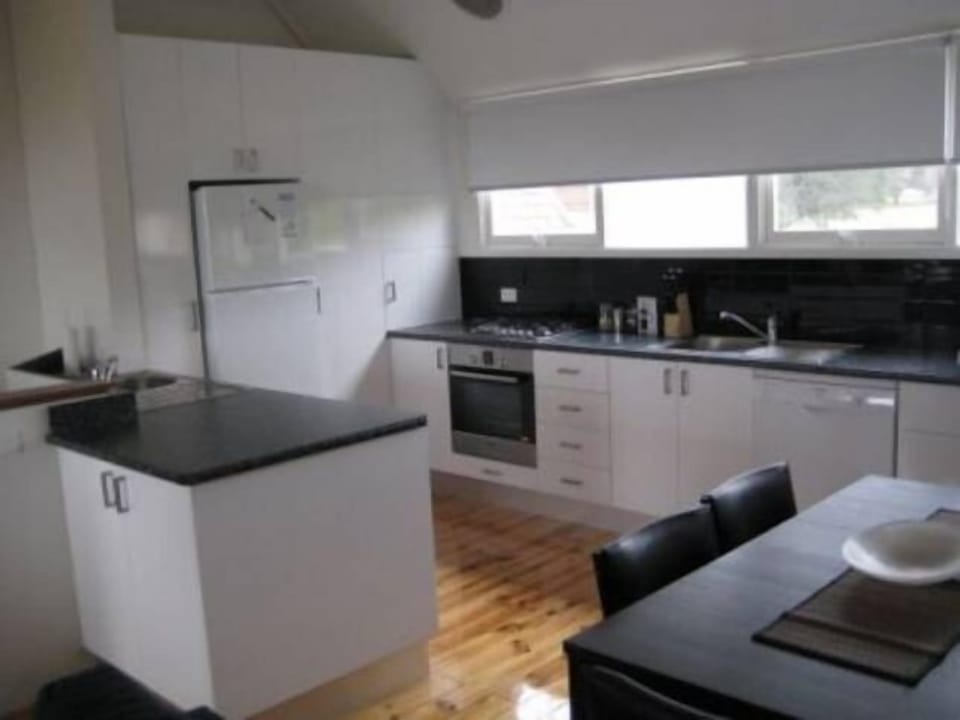 Full kitchen upstairs. Full fridge/freezer, oven, stove, microwave, dishwasher.