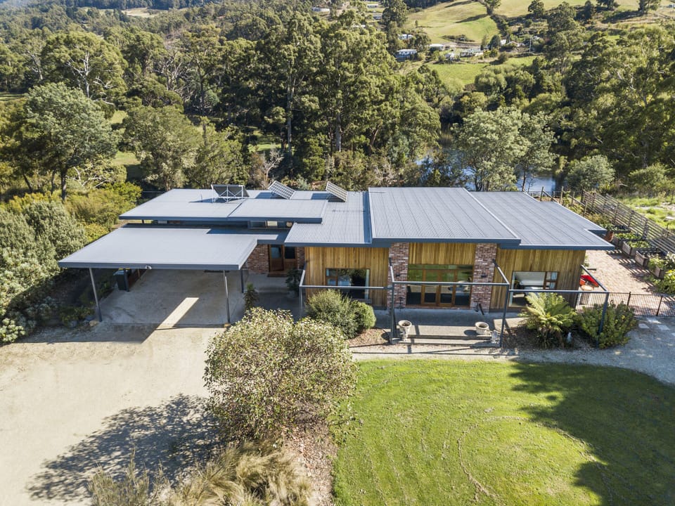 The property overlooks the Huon River, with access from the end of the street