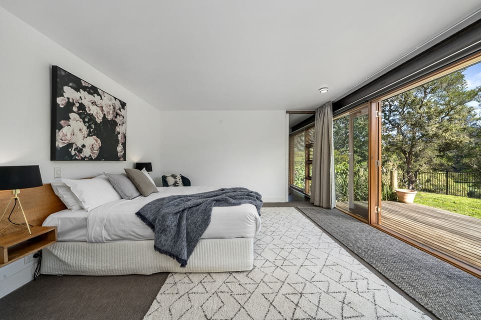 The master suite includes an ensuite, dressing room and its own deck