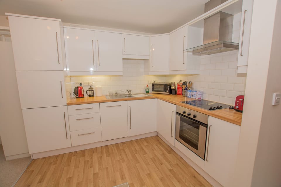 Kitchen with all amenities and crockery