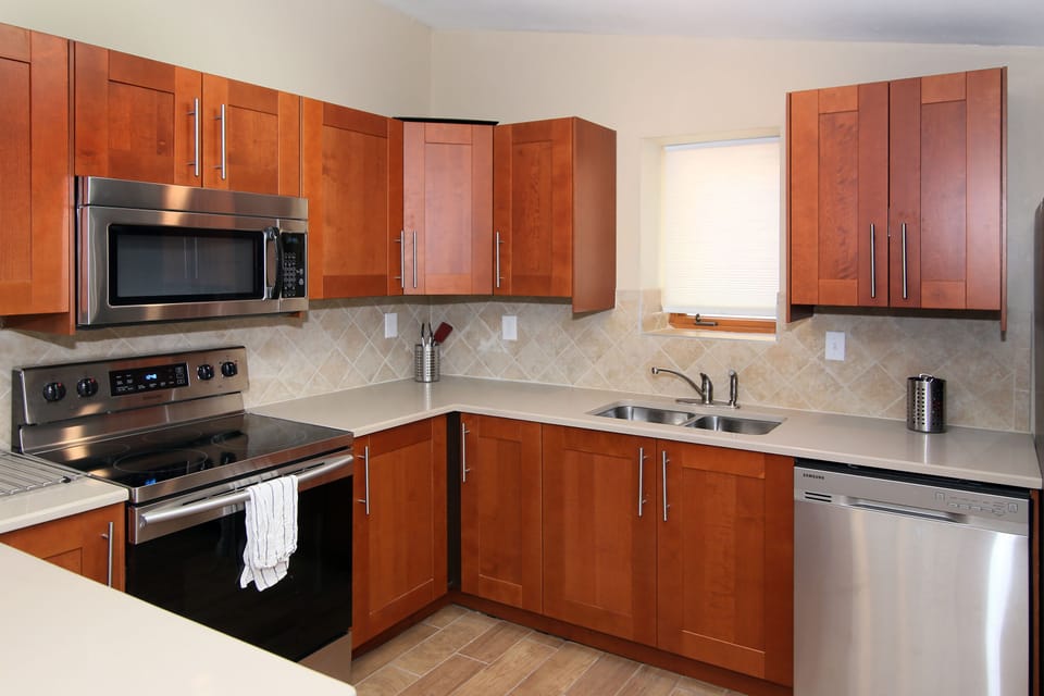 all stainless steel- complete with icemaker, microwave and dishwasher