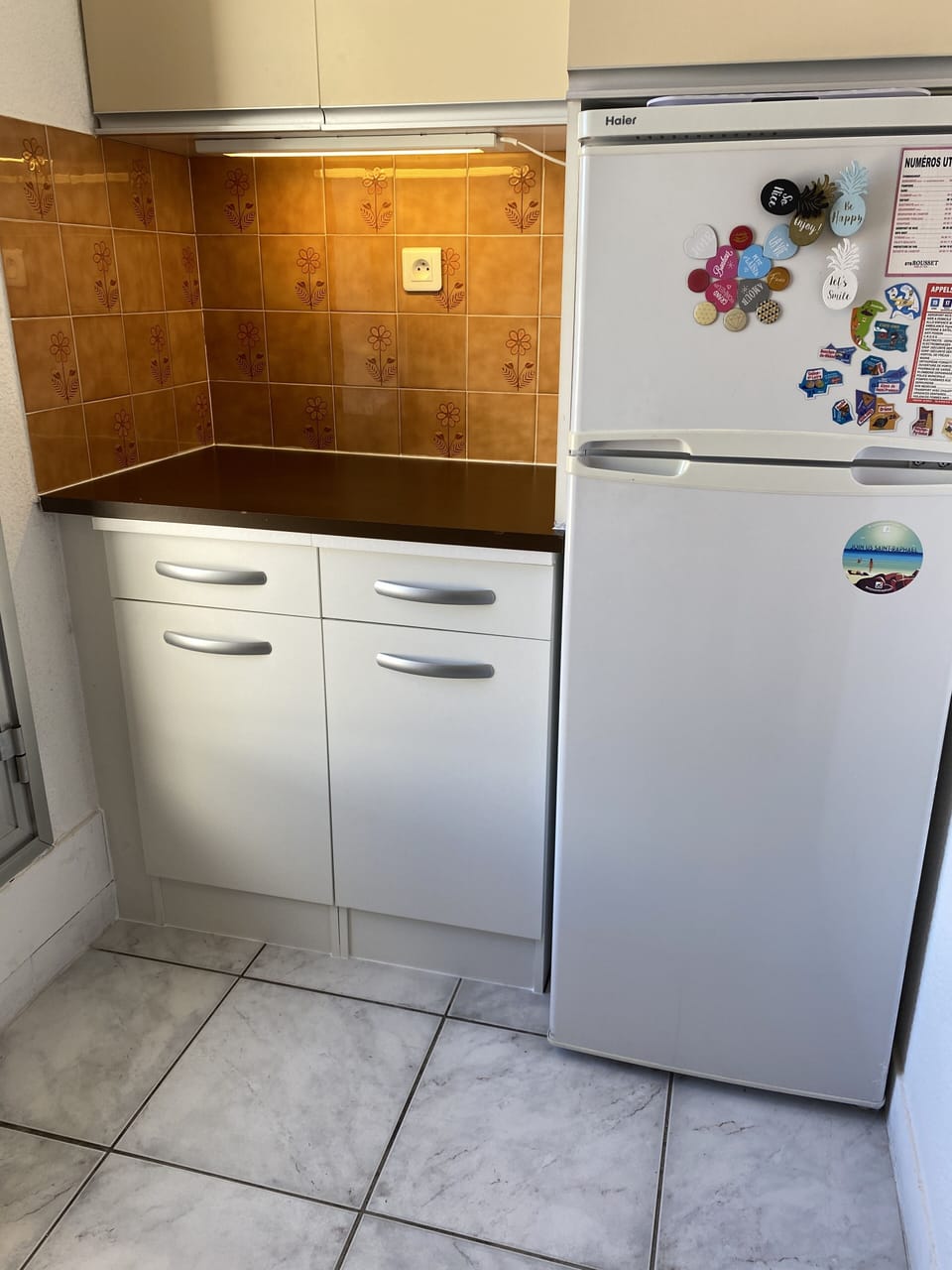 Kitchen leading out to large East facing terrace.