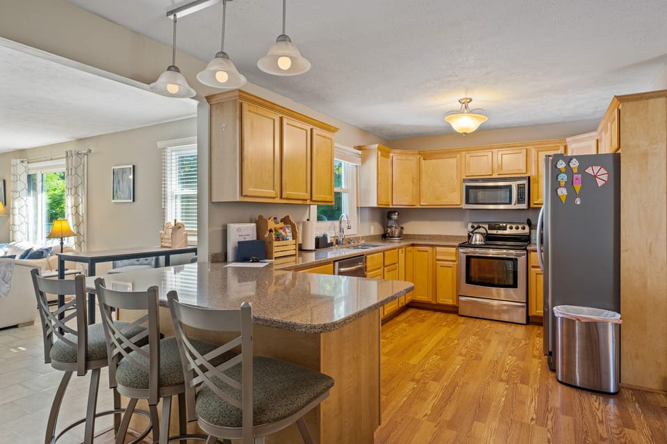 Fully-equipped kitchen with service for 20+ and plenty of natural lighting