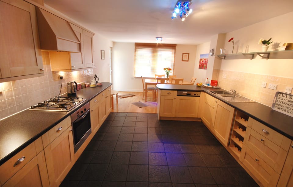 Large, very well equipped kitchen with dining area. 