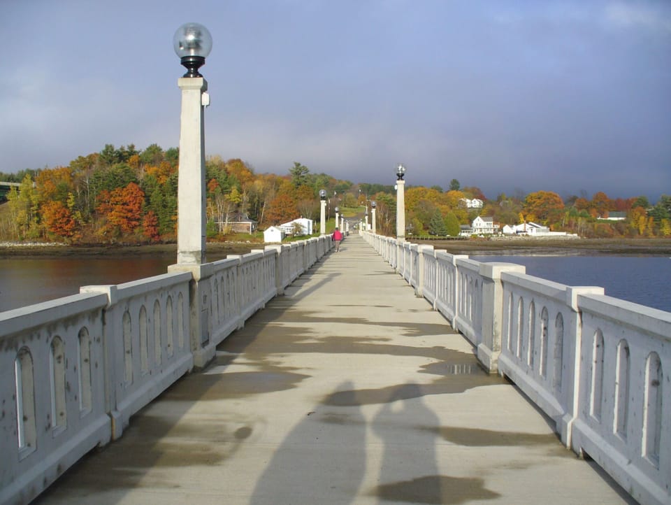 Cross the foot bridge at the bottom of our street and walk into town.