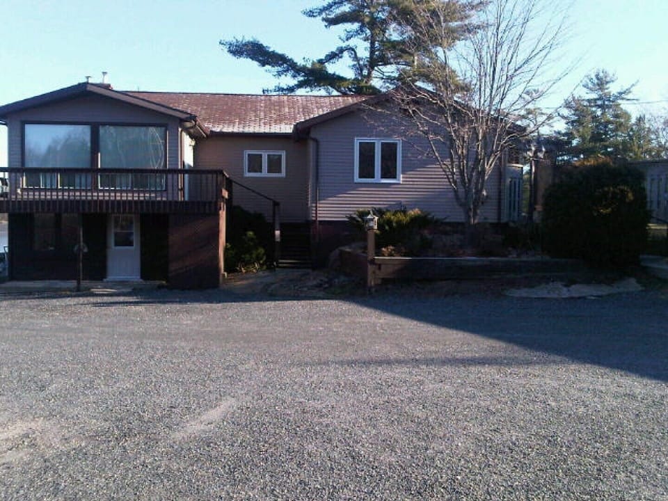 Large flat parking area behind house