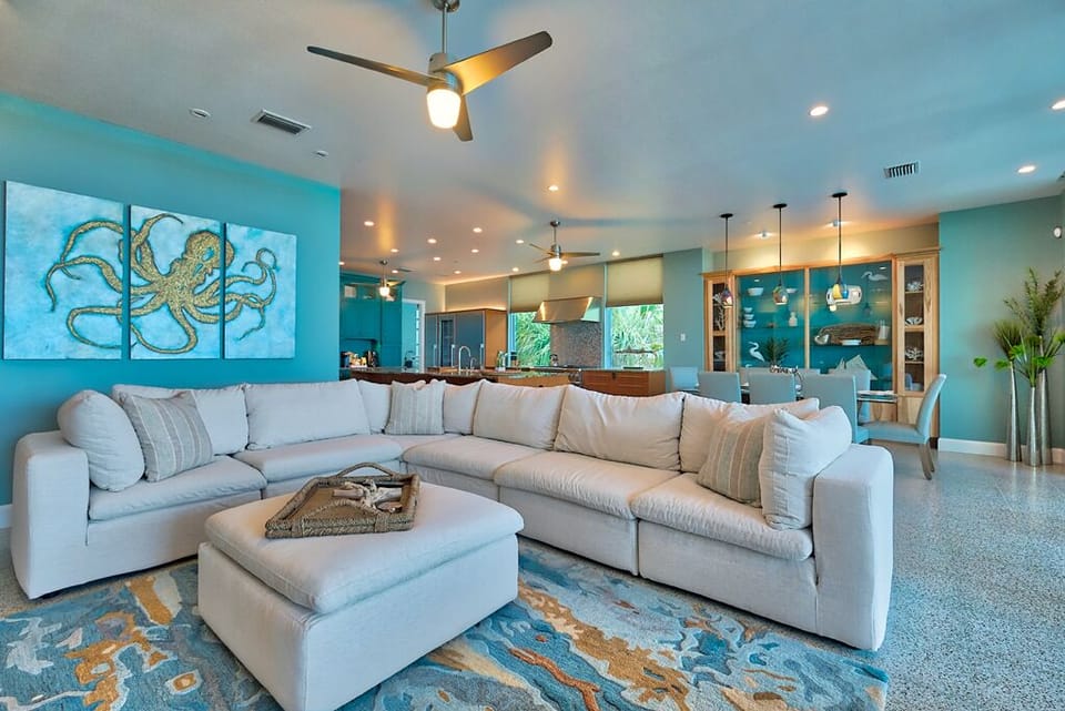 Spacious Living Area - Open concept with living, dining and kitchen all directly facing the beach!