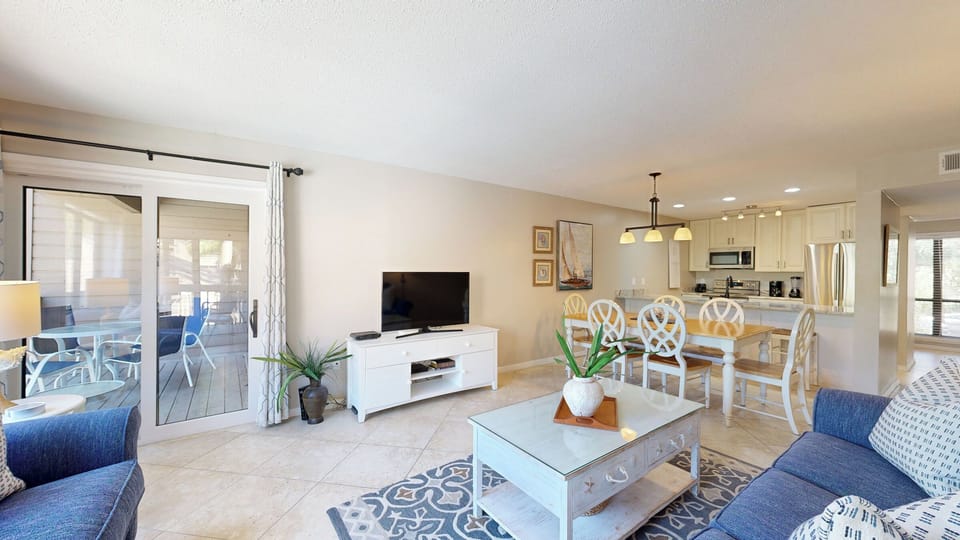 Living Room with Dual Access to Private Decks