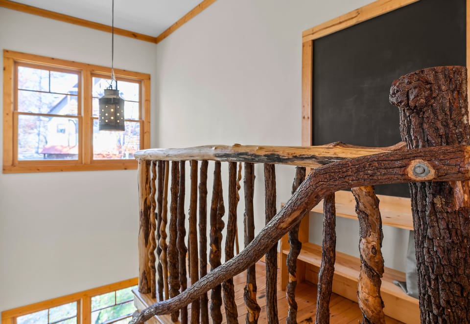 Just Look at This Custom Log Stair Railing!