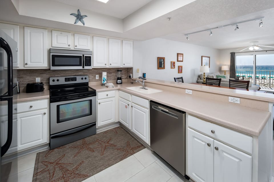 Additional view of full-size kitchen in GD 215 - Smooth top range is a big perk for those who like to cook!!
