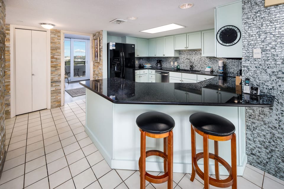 Kitchen/bar stool area - Fully Stocked Kitchen