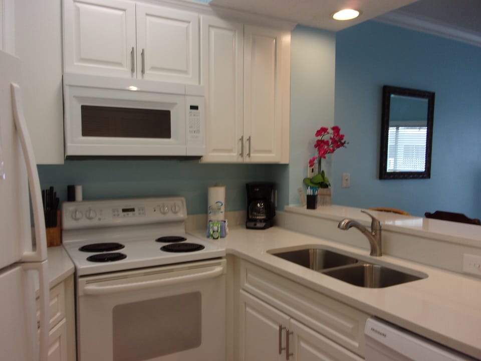 New cabinets with quartz counter tops.