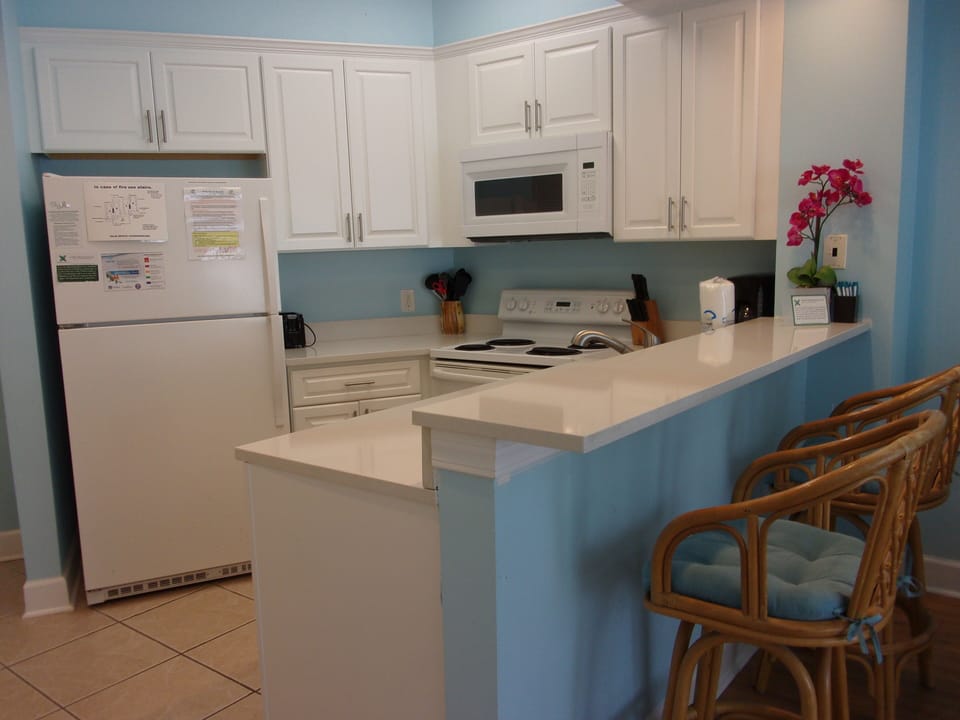 Sit at the bar and watch your chef prepare dinner.