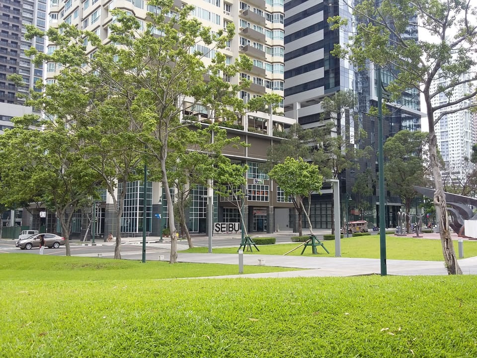 Mini greens park at the front of building