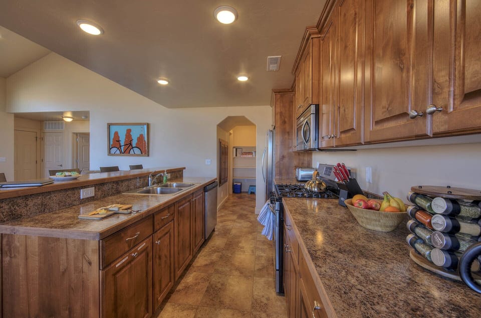 Kitchen, plenty of storage and an ice chest for use during your stay
