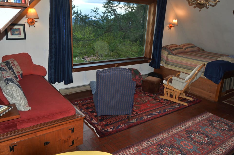 Great Room Picture Window, Captain's bed (Left), King Bed (Right)